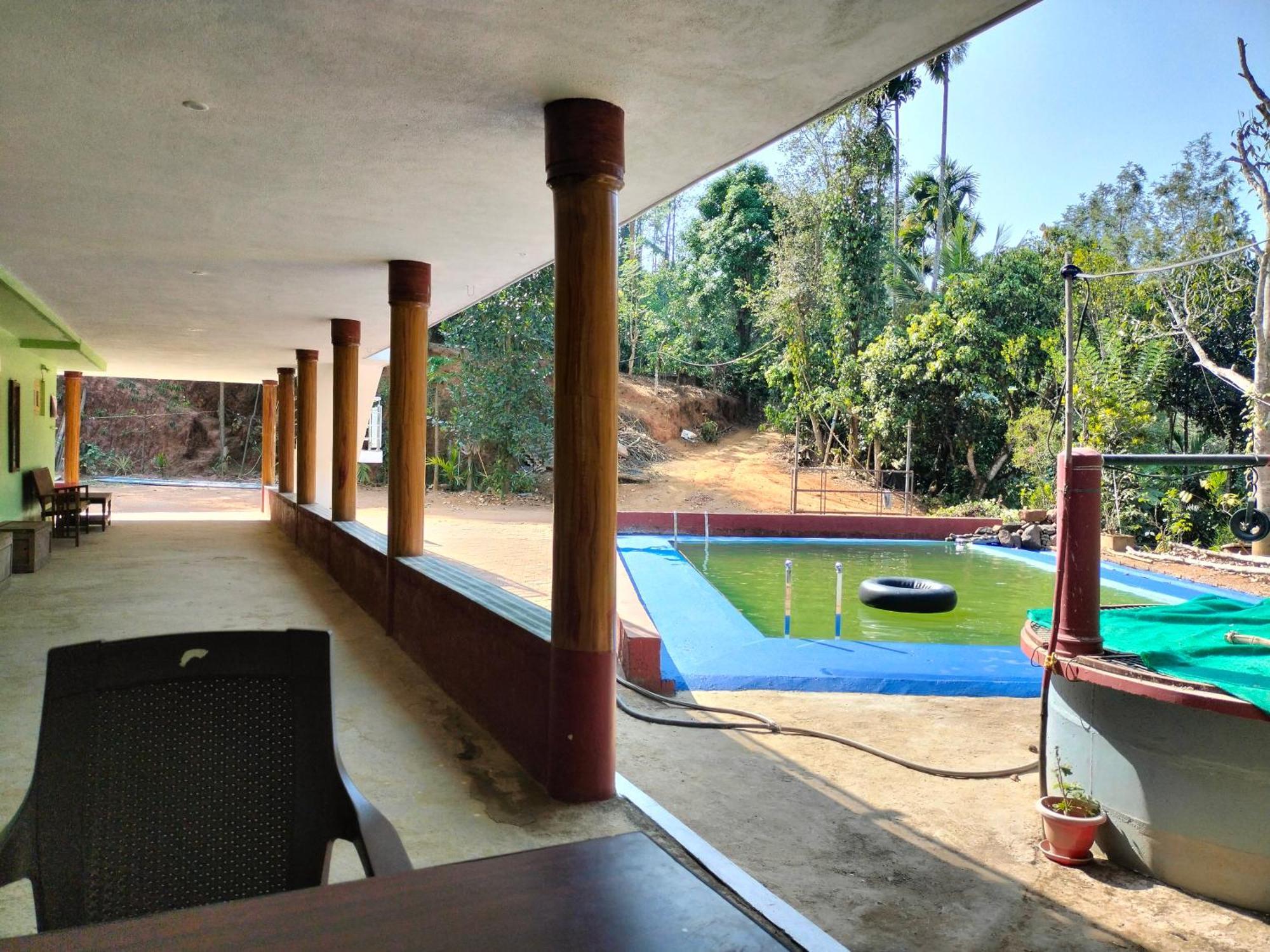 Villa Sambrama Wood House à Madikeri Extérieur photo